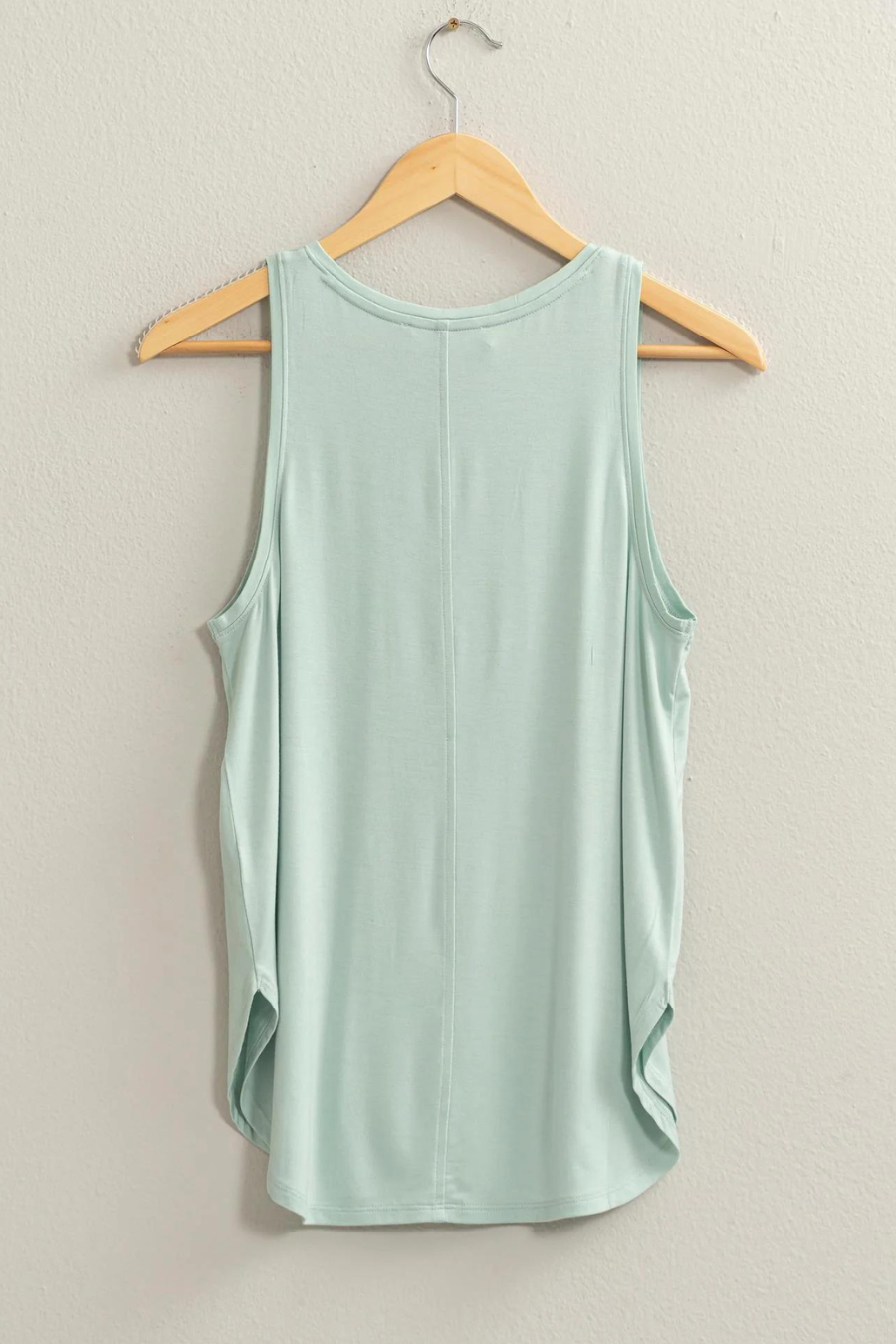 back view of Joey v neck tank hanging on a hanger in the color seafoam 