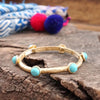 Turquoise Jeweled Golden Bangle