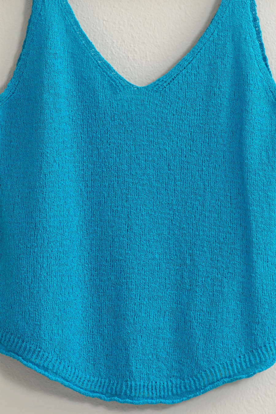 close up of blue knit top