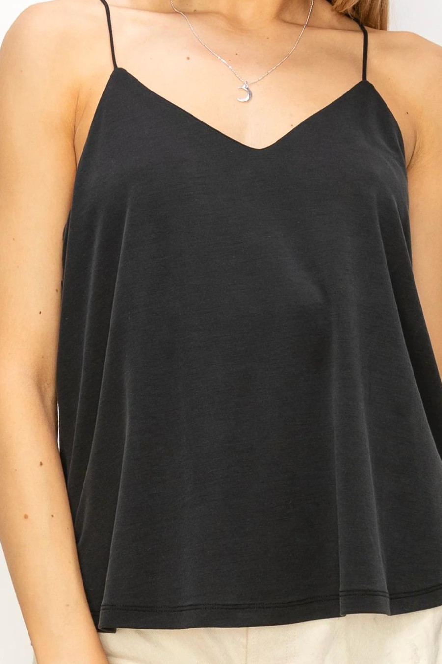 close up detail view of Romee v neck cami in the color black