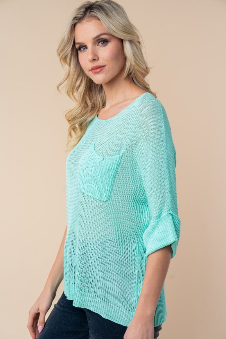 close up side view Josie boat neck sweater in the color mint 