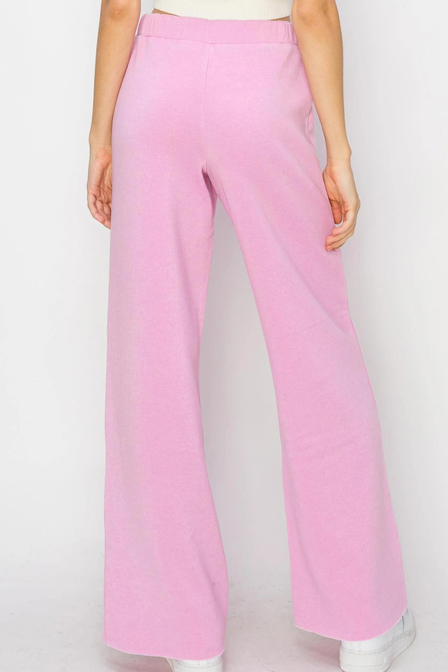 close up of back of pink eve drawstring flare pant 
