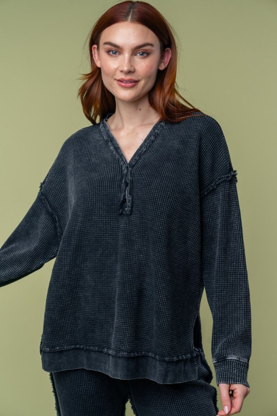 close up front view of cosette thermal washed top in the color black 