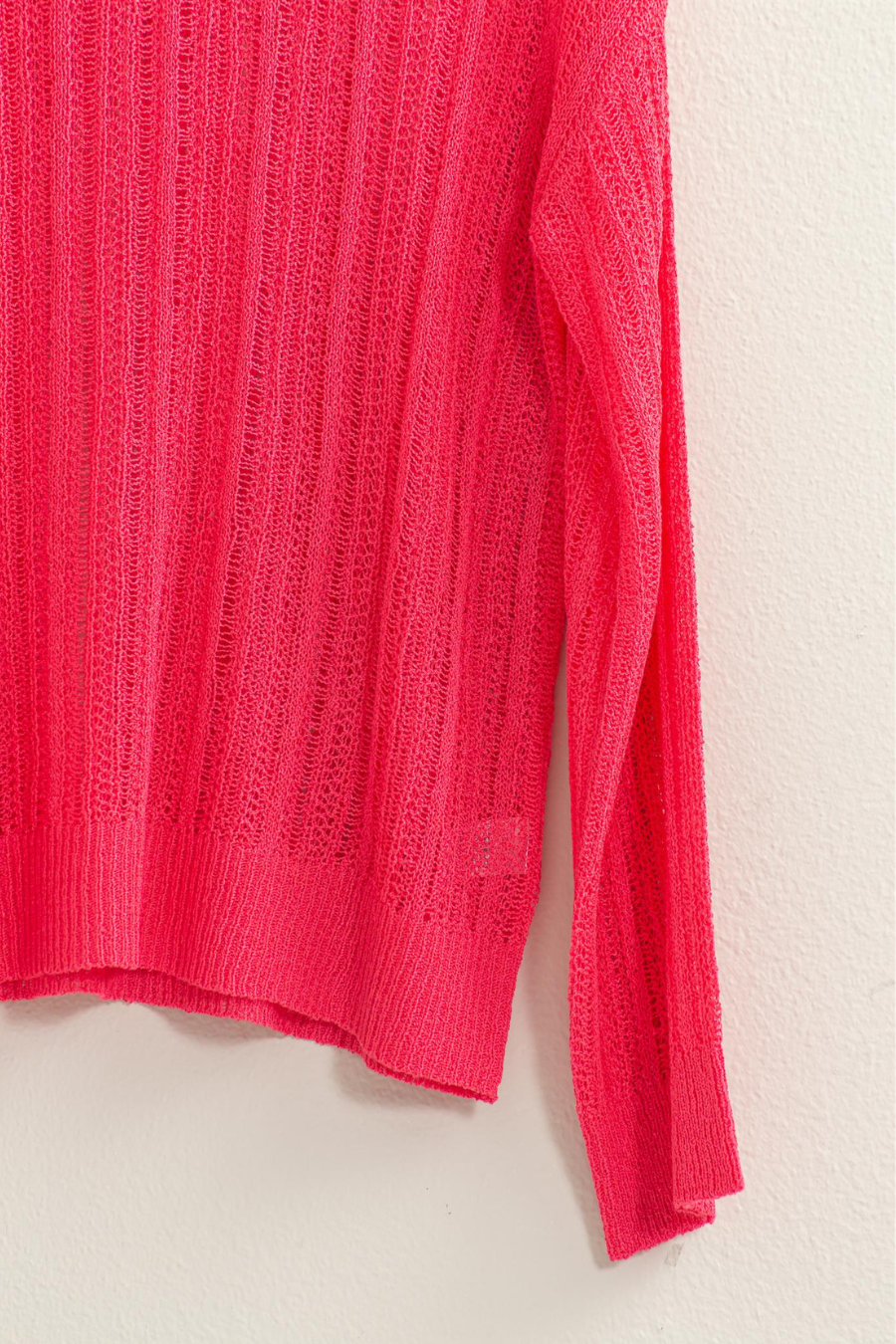 close up of knit of pink lottie sweater 