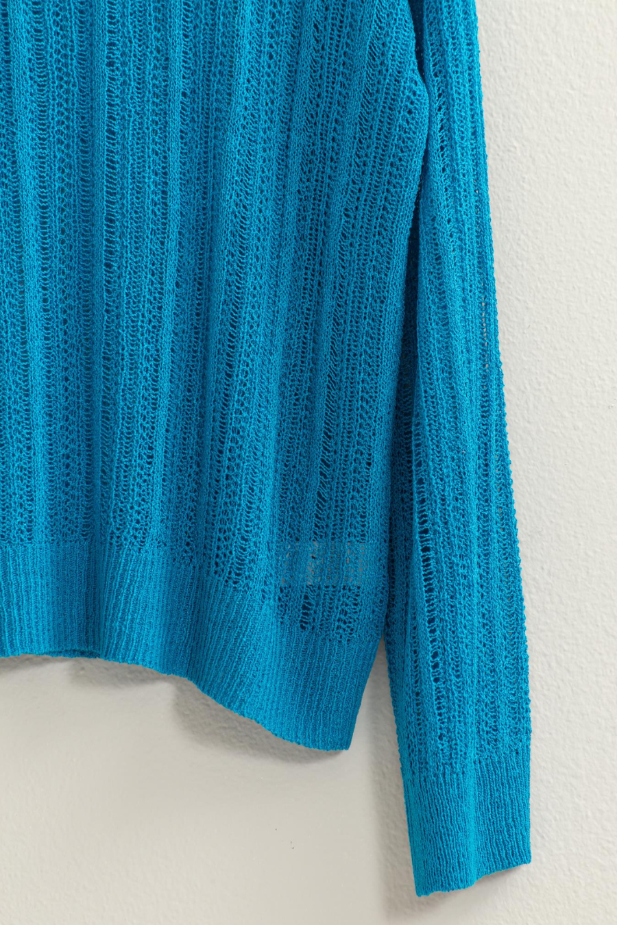 close up of knit of blue Lottie swearter