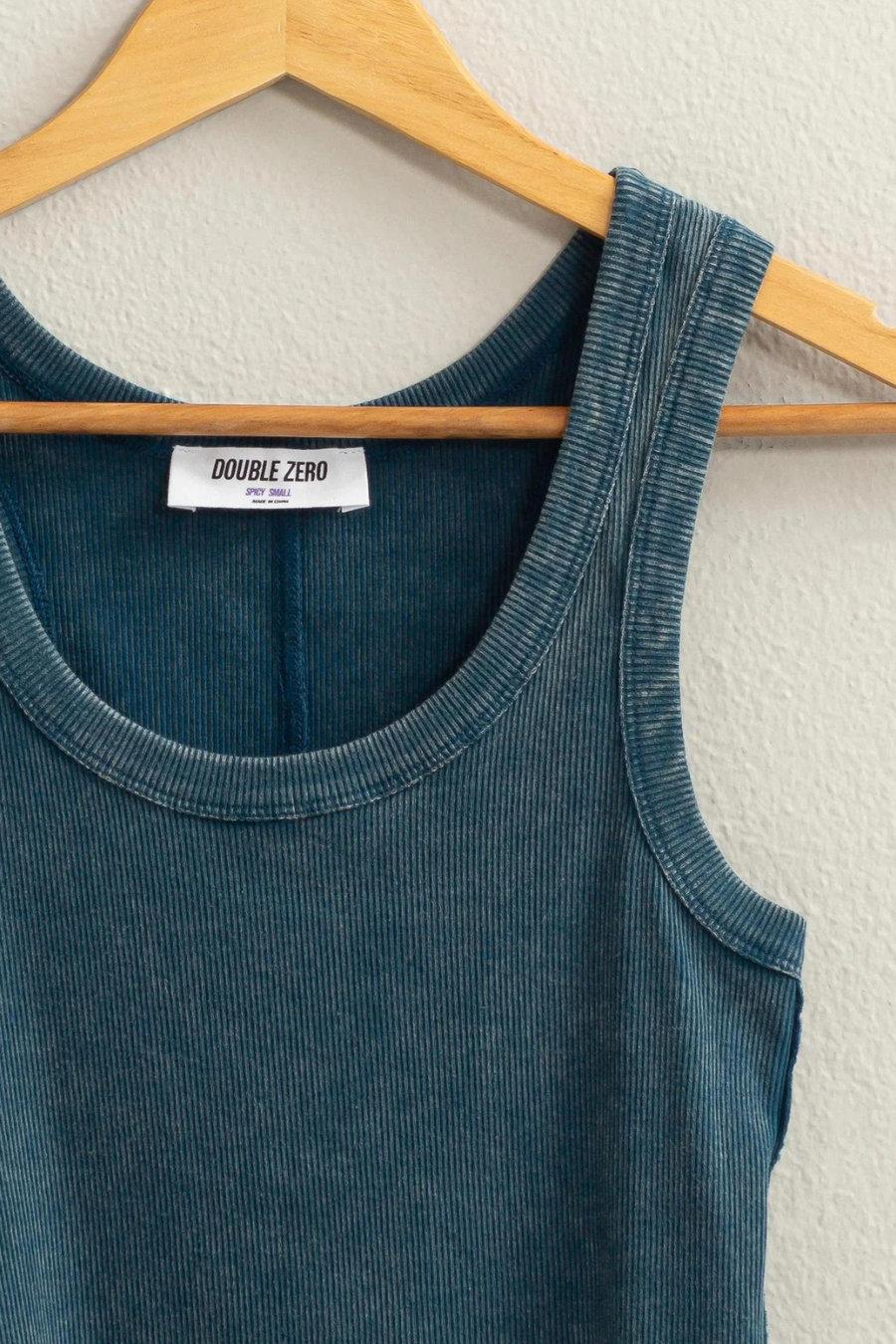 close up of ribbed detail of dixie acid wash tank top in teal 
