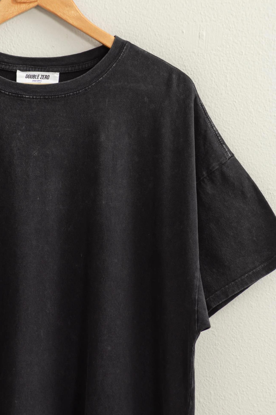 close up detail shot of Maisie over sized t shirt in the shade black 