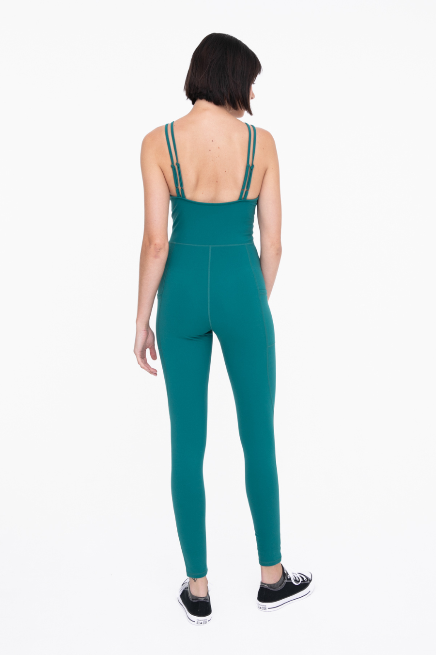 back full length view of the camilla sleeveless catsuit in the color teal 