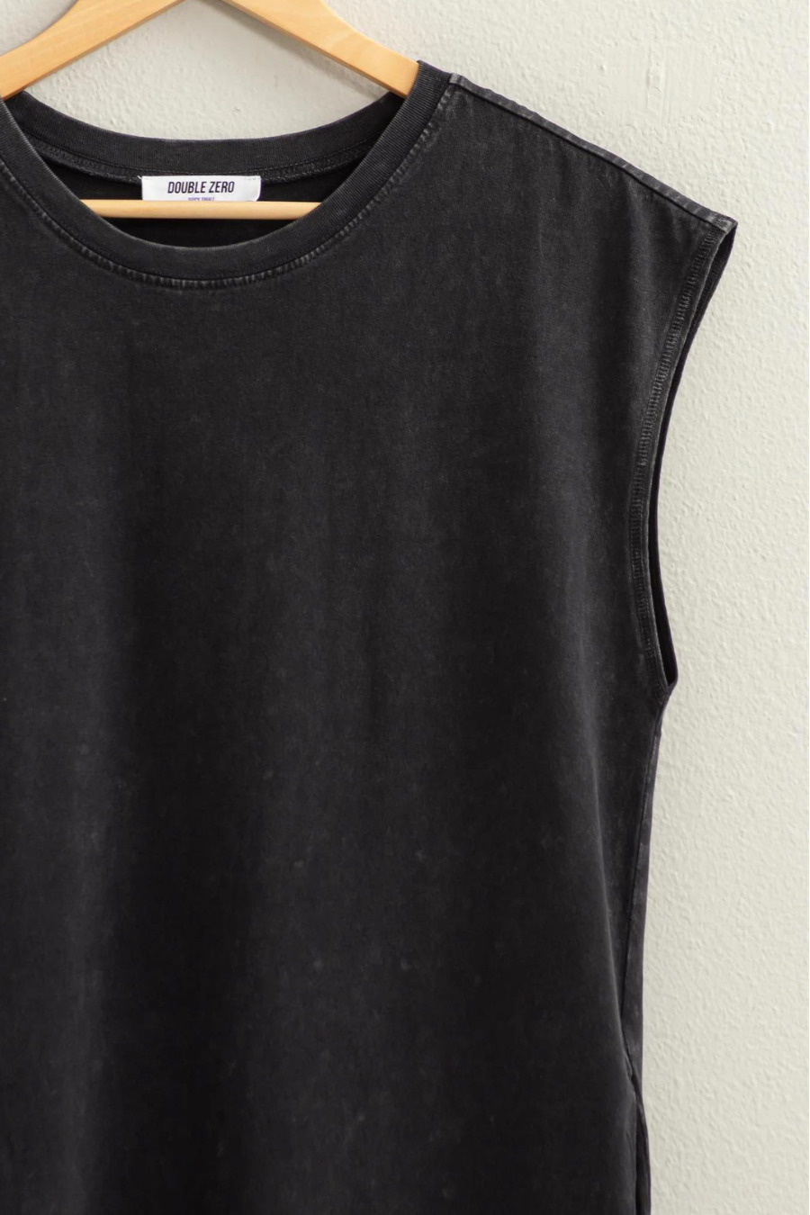 close up detail shot of the Mattie sleeveless dress in the color black 