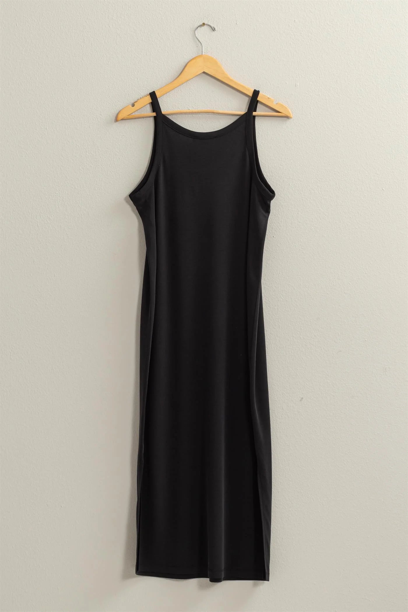 back full length view of birdie v neck midi dress, hanging on a hanger 