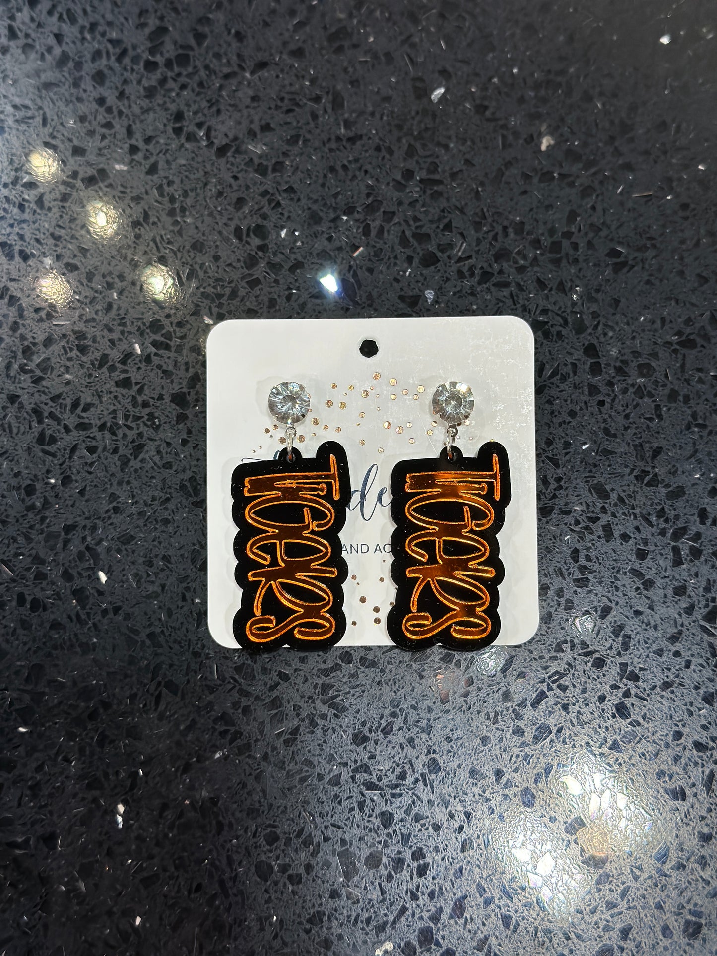 Tigers with black with orange writing