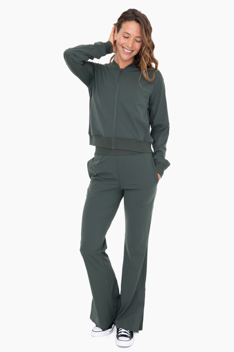 full length front view of the graphene blend boxy bomber jacket. Model is wearing it with matching pants, sold separately 