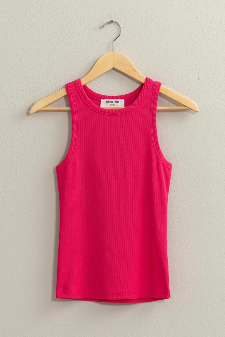 full length of pink tank top on wooden hanger