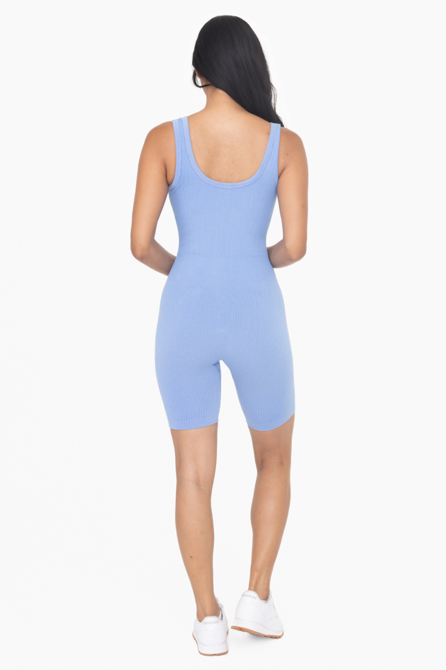 full length view of the ribbed seamless shorts romper in the color fog. 