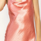 close up front view of the cowl neck on the stassi dress in the color coral 