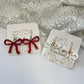 Holiday bow earrings