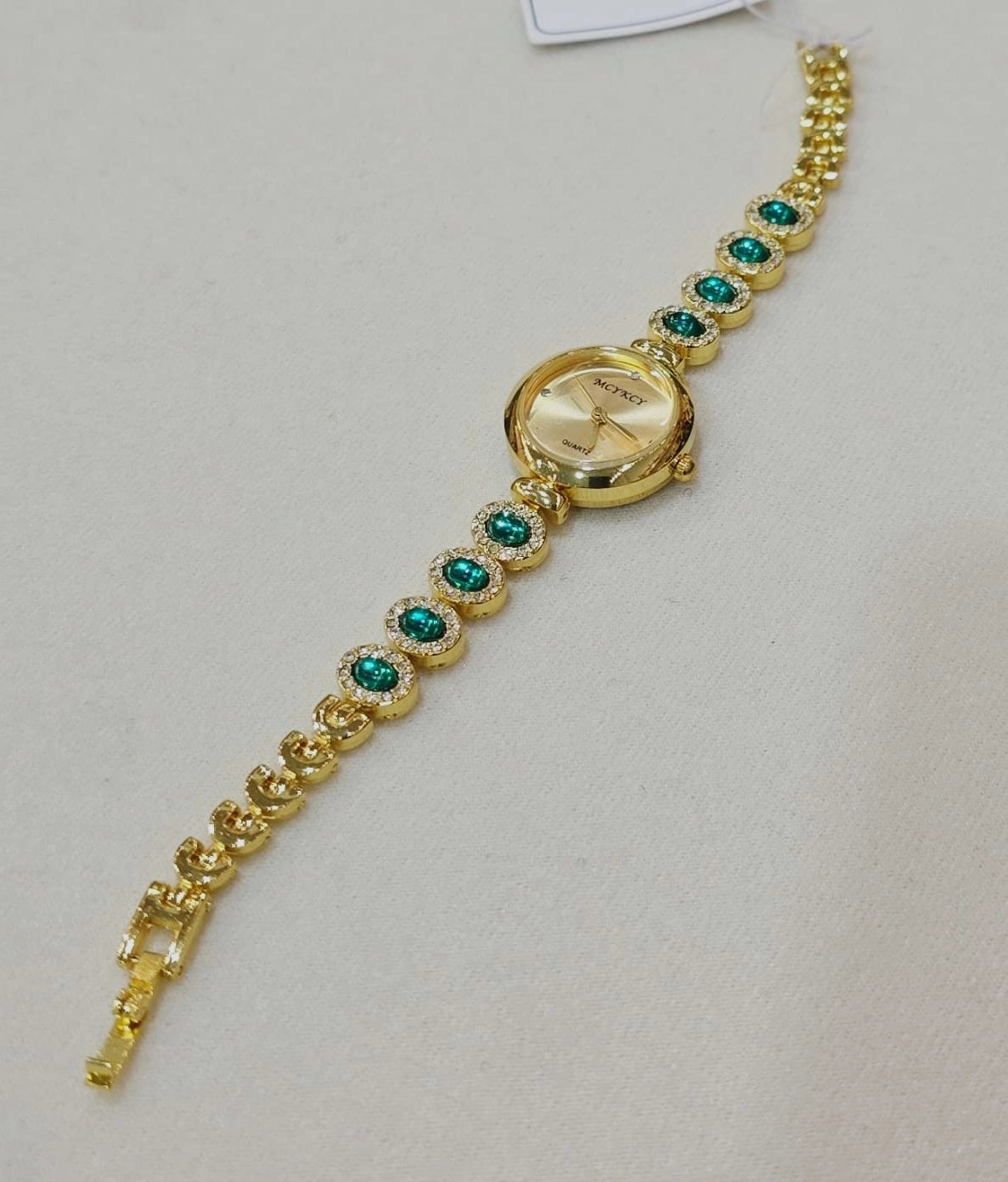 Gold Bracelet Watch with Green Crystals