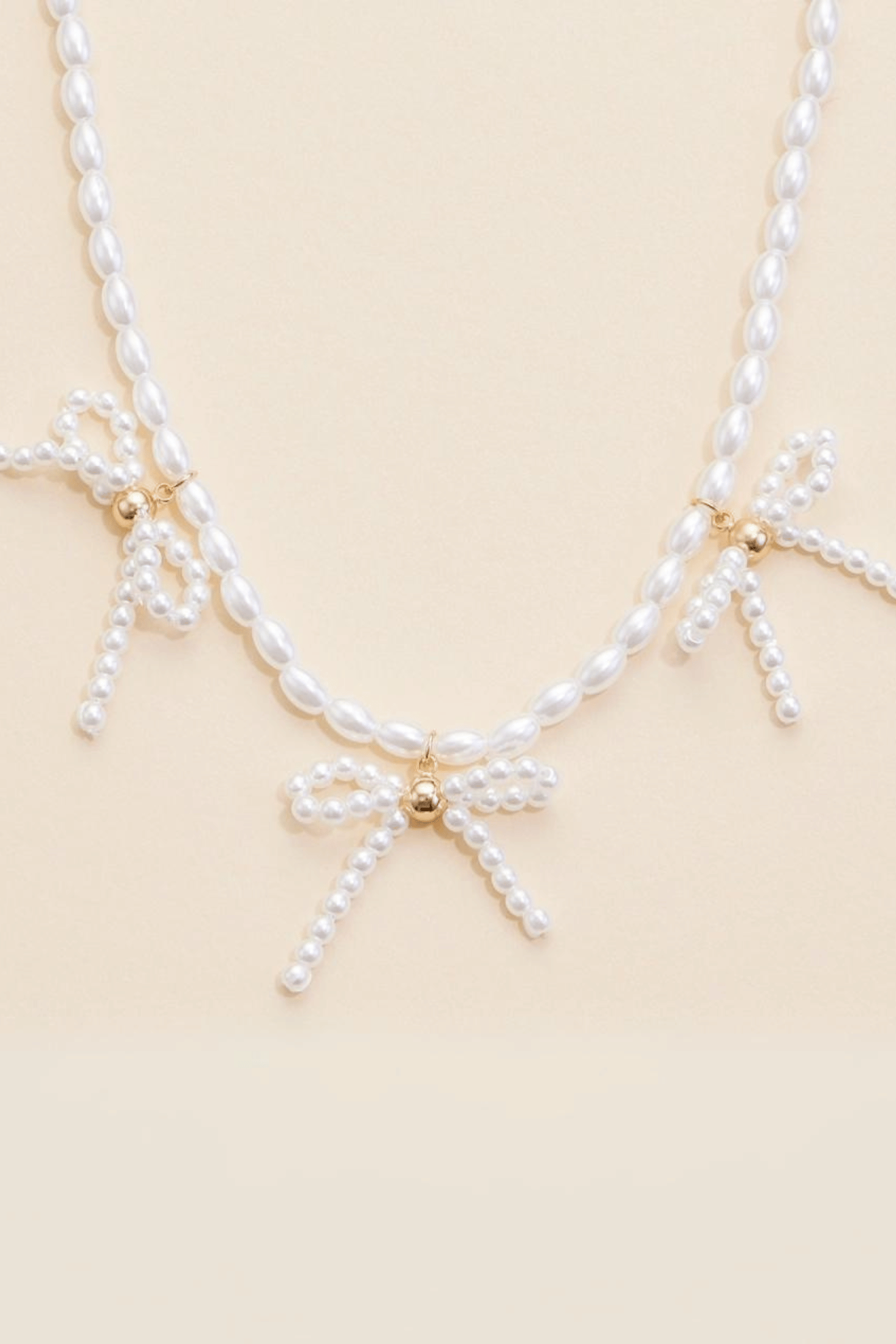 Pearl Beaded Bow Charms Necklace