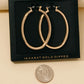 Secret Box Gold Dipped Oval Tube Hoop Earrings