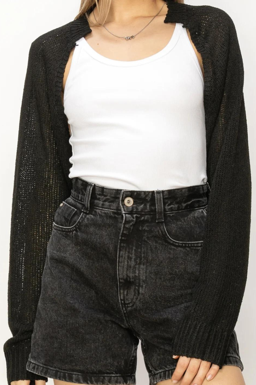 close up of Bianca bolero, model is wearing it with a white tank and black denim shorts