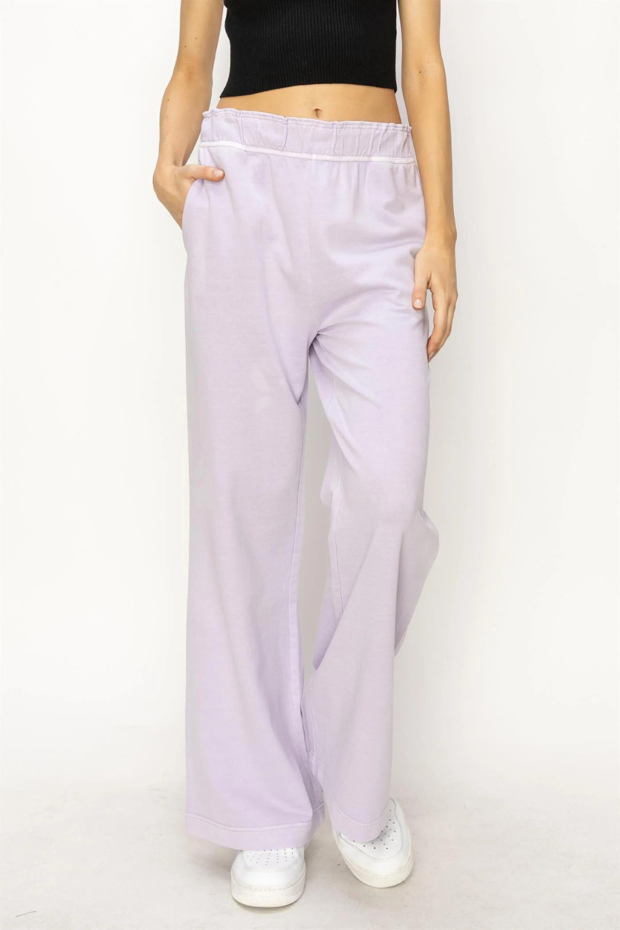 front close up view of Presley high waist flare pants in the color lilac 