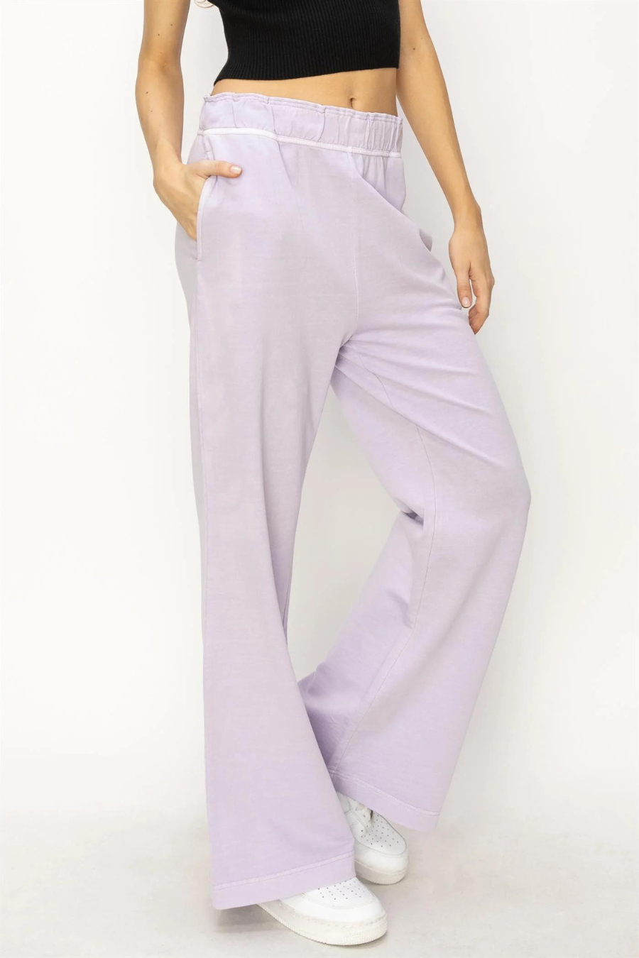 front side  close up view of Presley high waist flare pants in the color lilac 