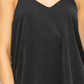 close up detail view of Romee v neck cami in the color black 