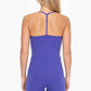 back view of the Justina spaghetti strap romper, showing off the t strap adjustable straps in the color royal purple 