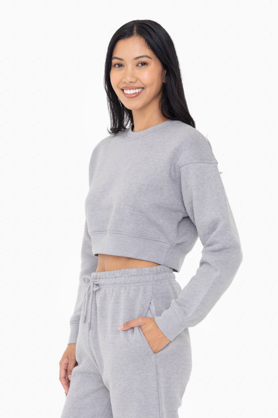 close up side view of the gray cropped hoodie with matching pants