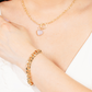 model is wearing aniston chain bracelet on her wrist 