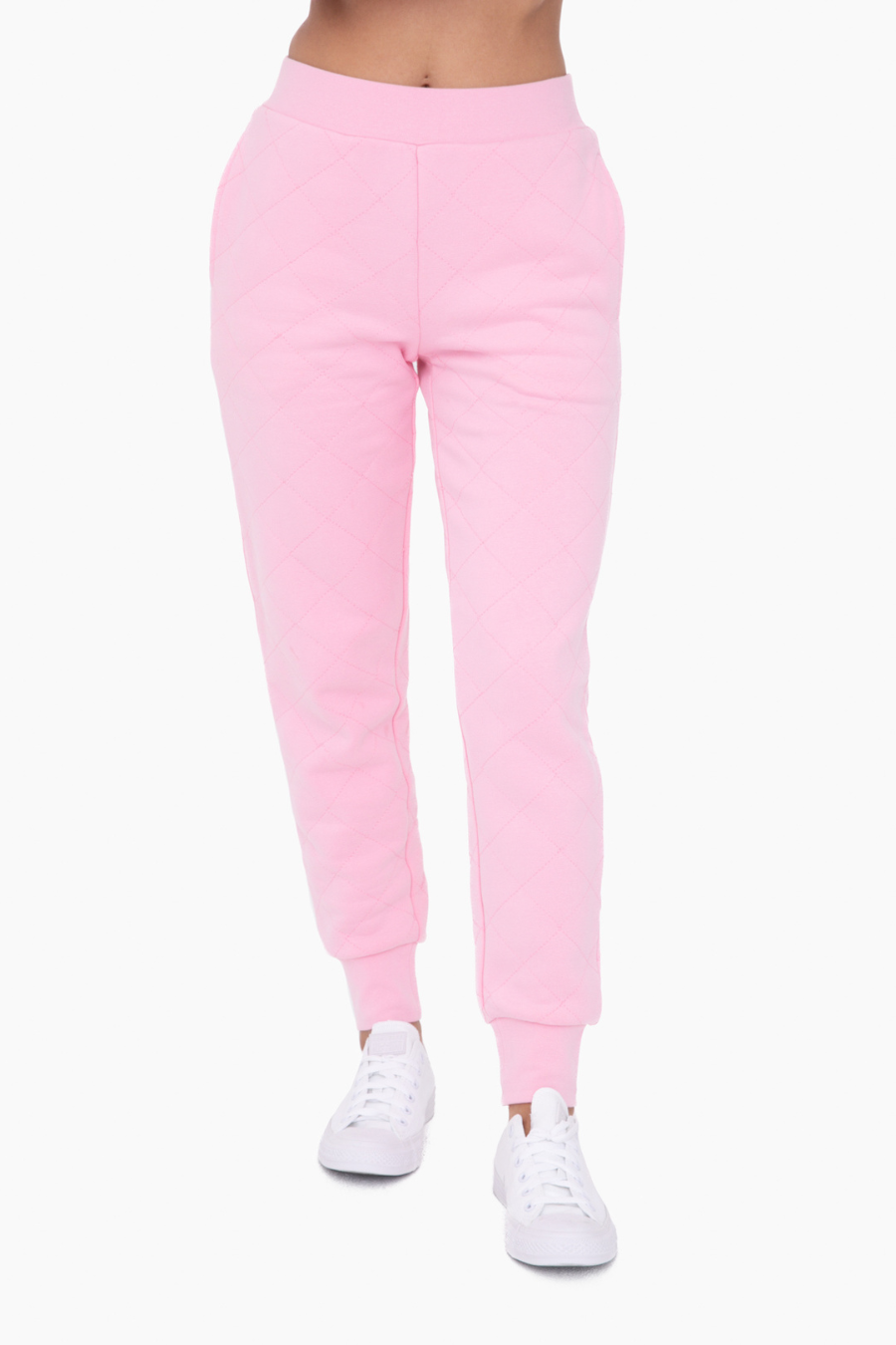full close up view of the cotton candy high waist joggers. model is wearing them with white tennis shoes 