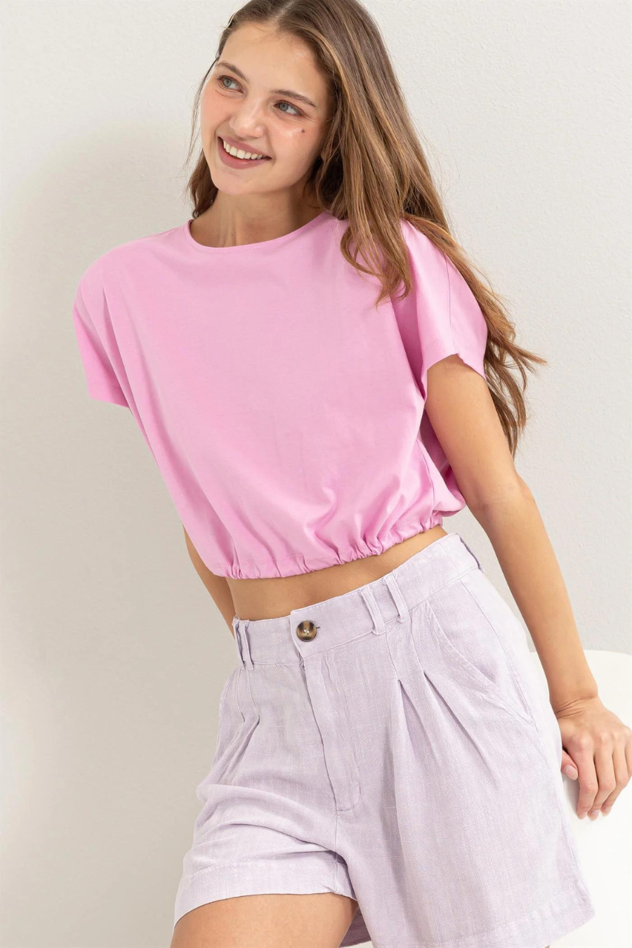 close up front view of Dakota drawstring hem crop top in the color pink 