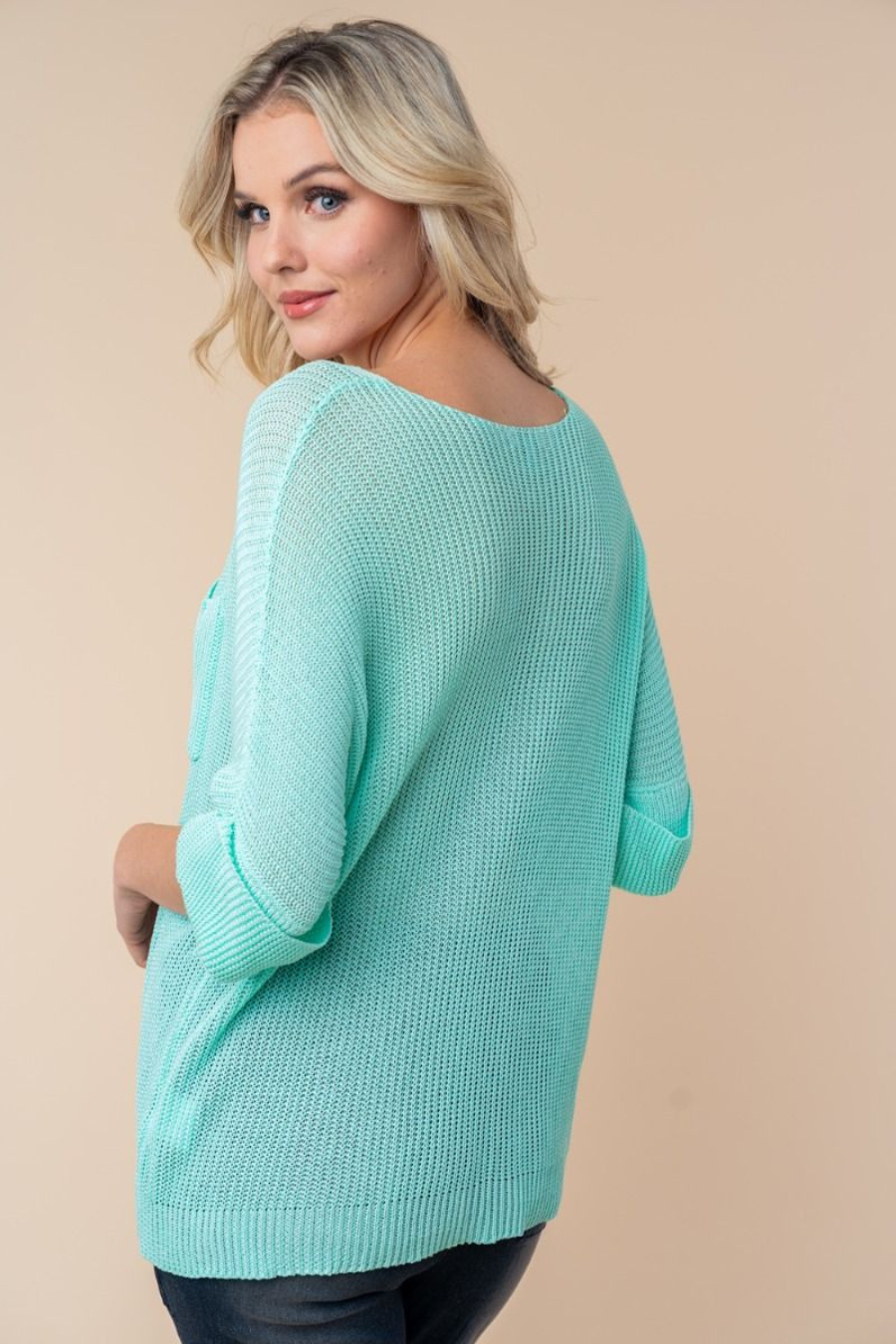 close up back view Josie boat neck sweater in the color mint 