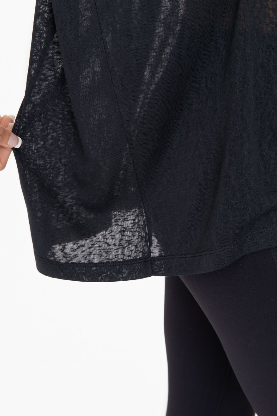 close up on the material on the mina top in the color black
