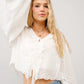 Ruffle Front Tie Eyelet Embroidered Top