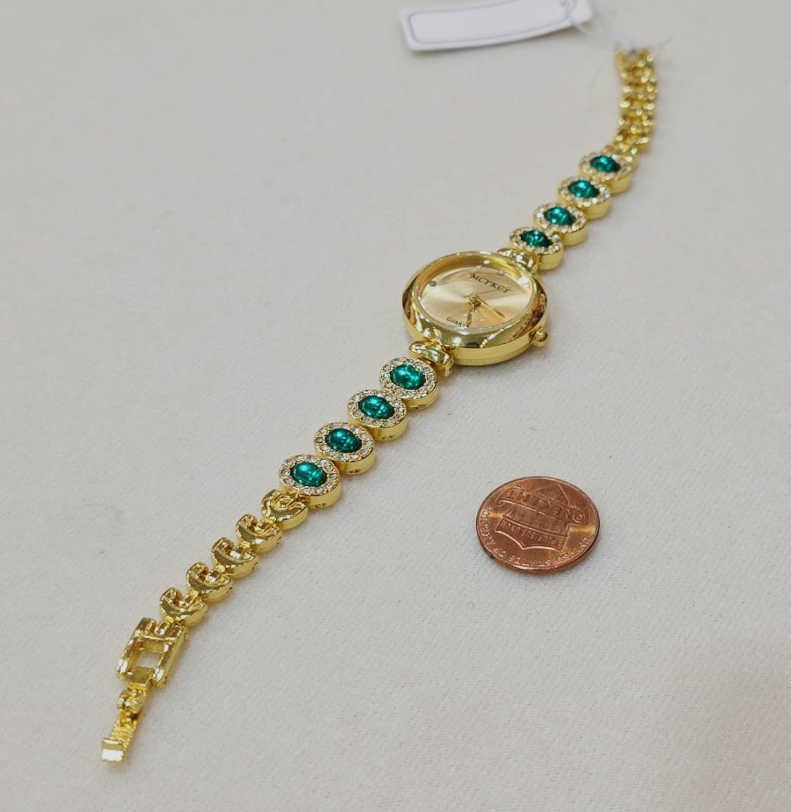 Gold Bracelet Watch with Green Crystals