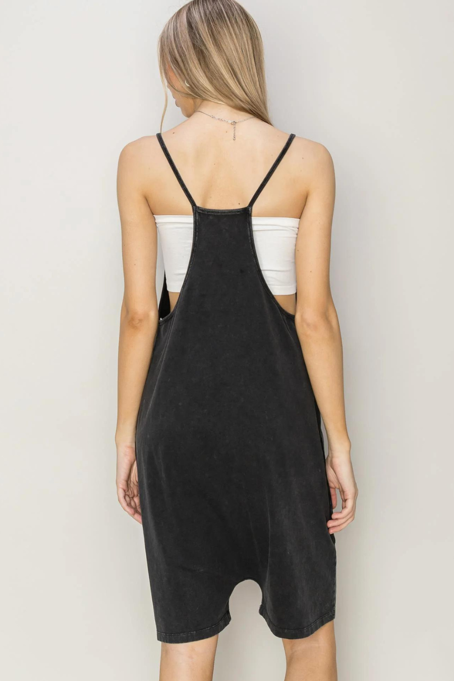 back view of the front mineral romper in black 