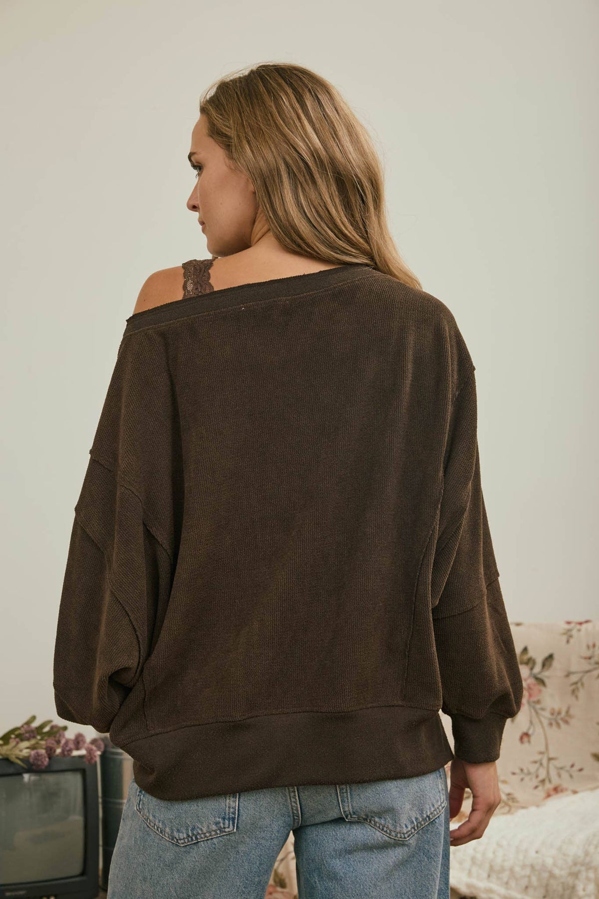 Tiered Sleeve Boat Neck Exposed Seam Knit Top
