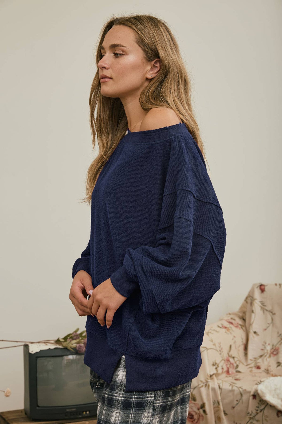 Tiered Sleeve Boat Neck Exposed Seam Knit Top