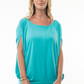 close up front view of capri boat neck short sleeve top in the color aqua, model is wearing top with white jeans