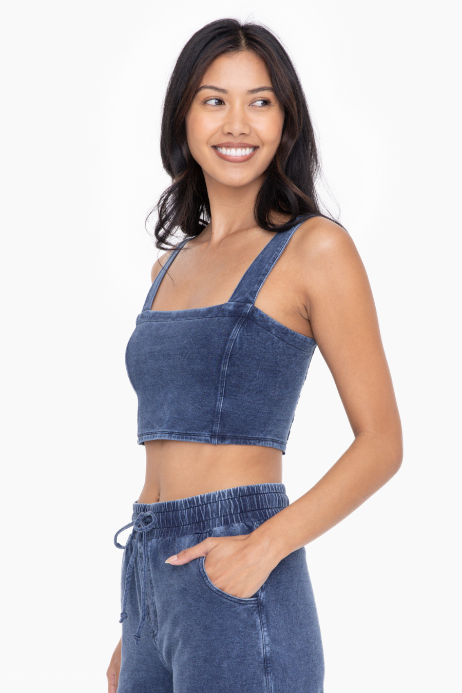 close up side view of denim cropped bra top