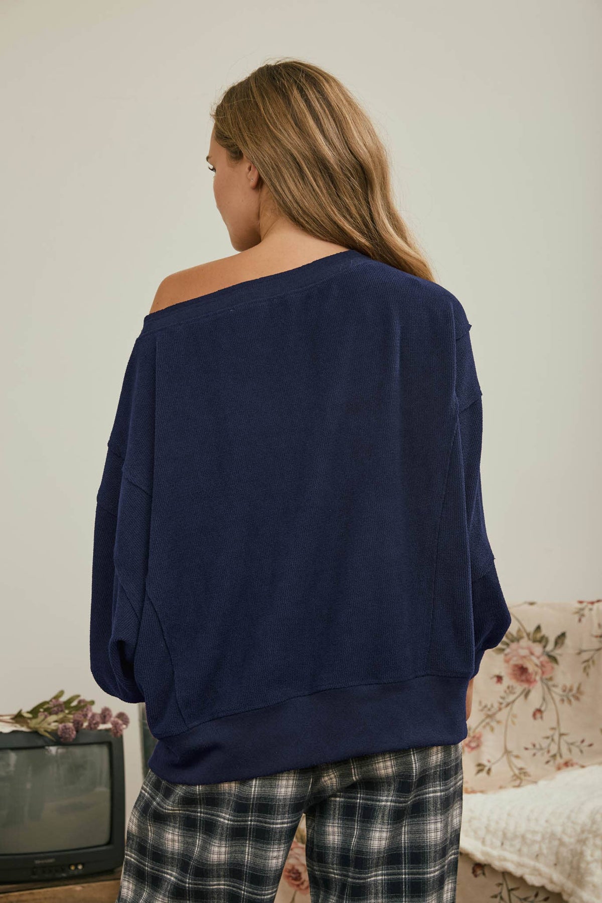 Tiered Sleeve Boat Neck Exposed Seam Knit Top