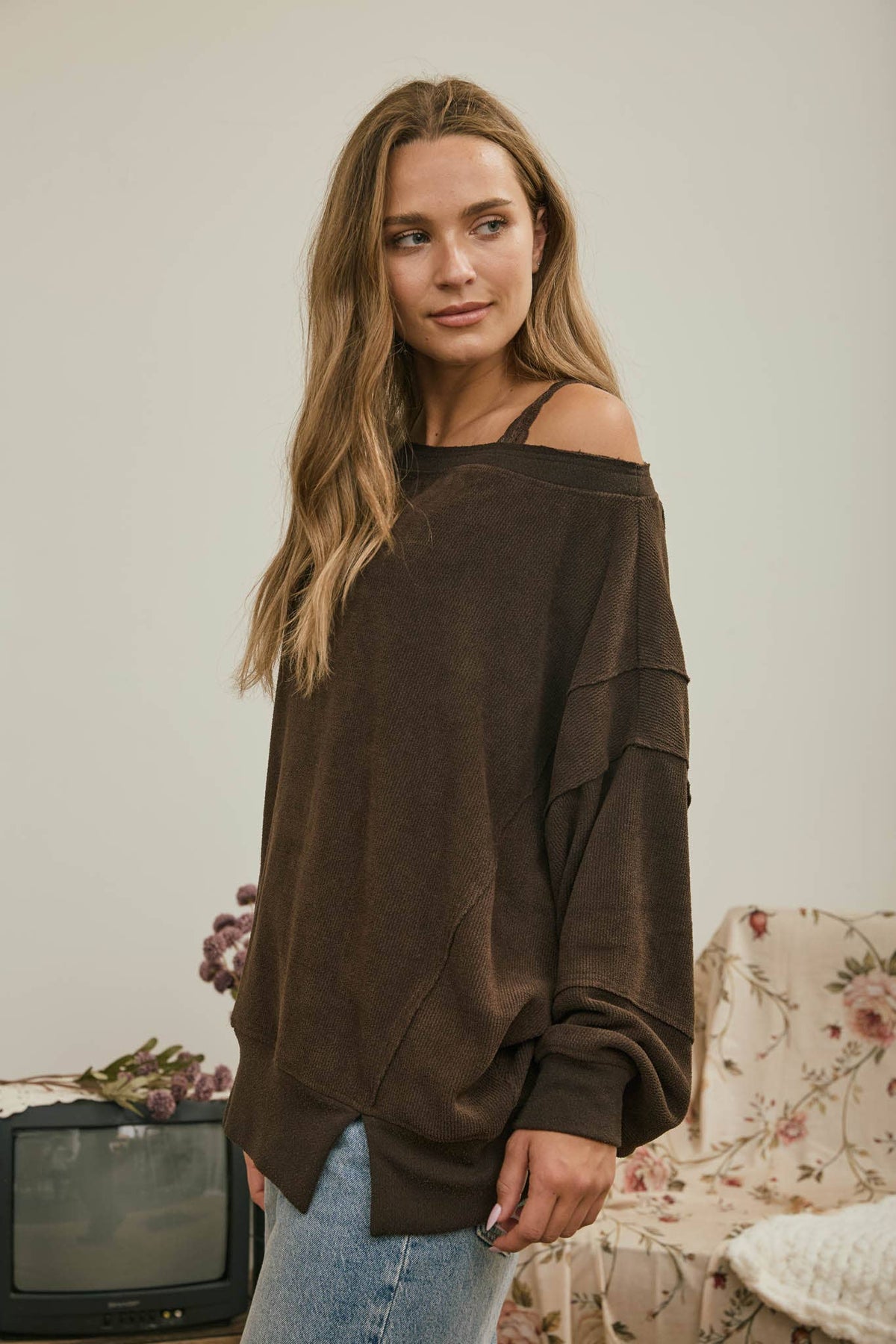 Tiered Sleeve Boat Neck Exposed Seam Knit Top