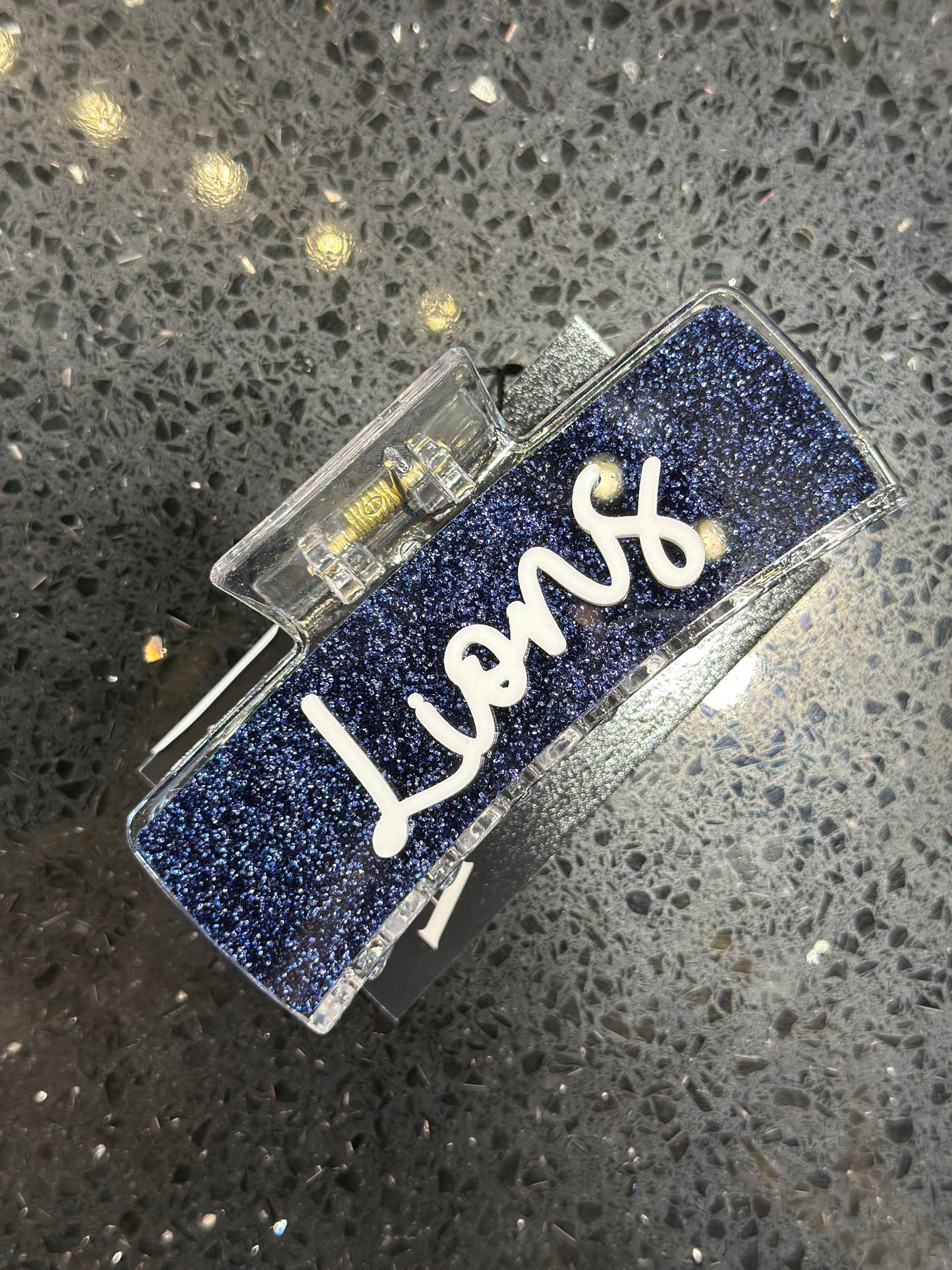 Lions navy glitter with white writing hairclip